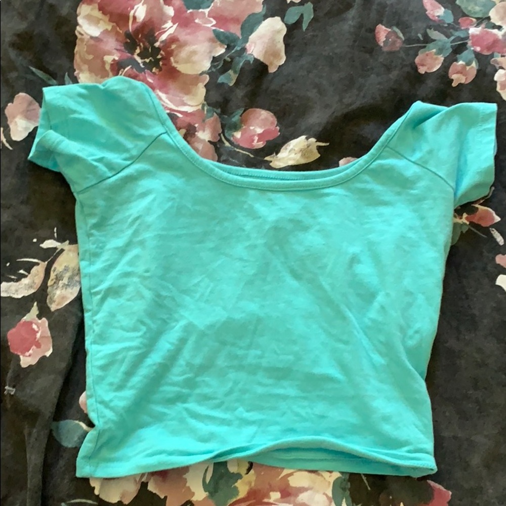 a teal/blue crop top